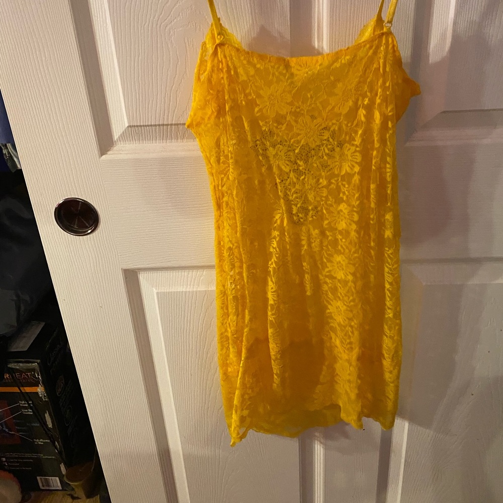 Yellow Spaghetti strap with a bling on the front